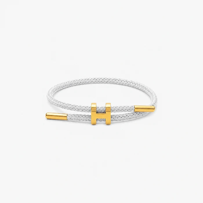 Pulseira Supima H'ills branca ajustável com detalhe dourado