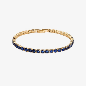 Pulseira Riviera Gold Sea dourada com zircônias azuis em fundo branco