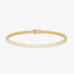 Pulseira Riviera Sunrise dourada com zircônias brancas em fundo branco